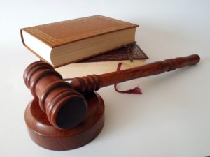 judge gavel with book